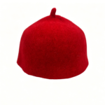 Red felted wool hat on a stand